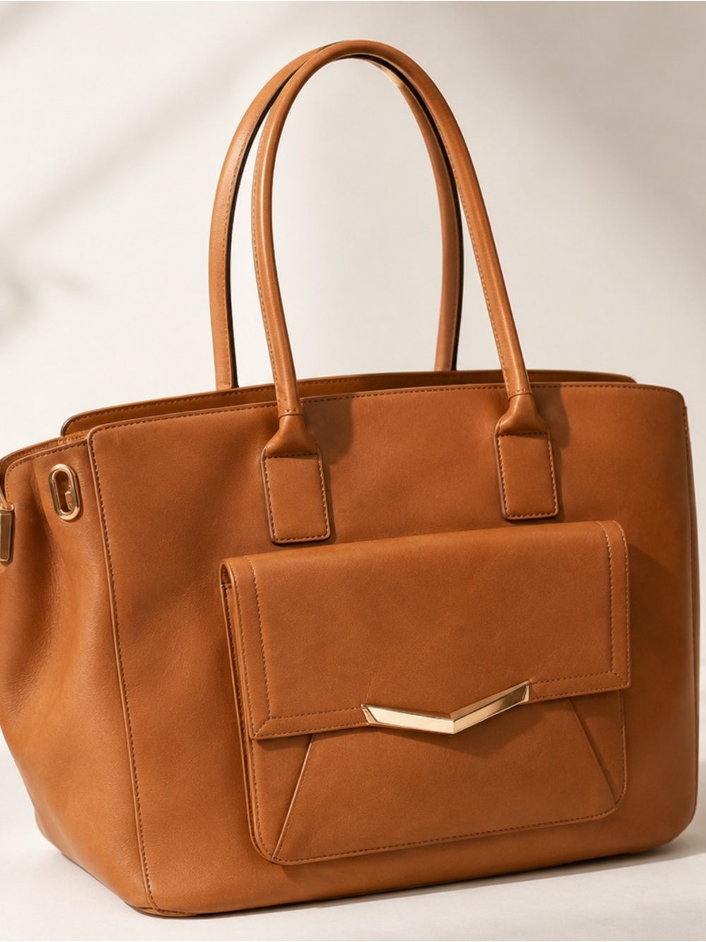New- Times Arrow Handbag